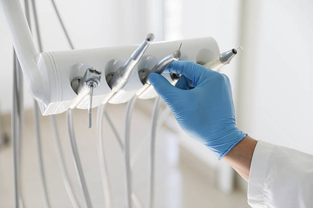 Professional Tooth Extraction technician working in Sugarland Run, VA